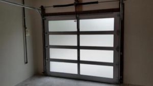 Small Modern Classic brown garage door with glass