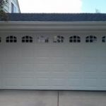 White Insulated Steel, traditional style garage door with decorative windows