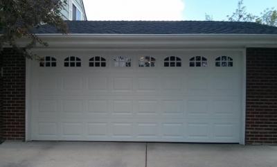 White Insulated Steel, traditional style garage door with decorative windows